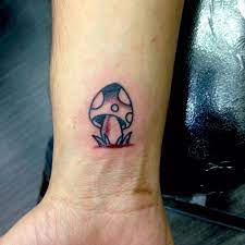 You can get a matching rainbow tattoo with your partner, or you can ink a single rainbow tattoo as a sign of respect for the lgbt members. Cutelittletattoos Mushroom Tattoos Tattoos For Women Small Wrist Tattoos