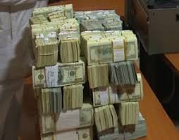 Image result for Former GMD NNPC admits ownership of recovered $9.8m
