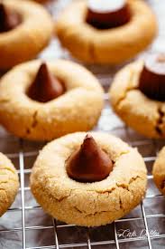 Peanut Butter Blossoms Hershey Kiss Cookies Are The Best Soft And Buttery Melt In Yo Peanut Butter Blossoms Recipe Peanut Butter Recipes Kiss Cookie Recipe