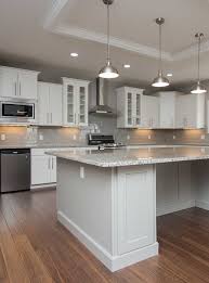 Plenty For The Eye To See In This Stunning Kitchen Two Tone Cabinets Staggered Heights Kitchen Cabinets Height Staggered Kitchen Cabinets Kitchen Renovation