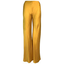 Stay informed on upcoming seasonal trends & shop your favorite designers online today! F W 1999 Christian Dior John Galliano Liquid Gold Bell Bottom Wide Leg Pants For Sale At 1stdibs