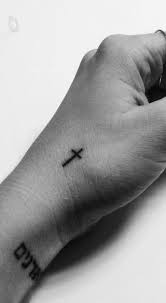 What does the cross tattoo on the index finger mean? 85 Amazing Cross Tattoos Designs And Ideas