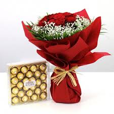 We provide beautiful gifts, cakes, chocolates, and flowers to customers in the city of dubai, united arab emirates (uae), as well as other cities in the region. Elegant Rose Bouquet With Chocolate In Uae Gift Red Roses Flower With Rerrero Rocher Flower Delivery Dubai