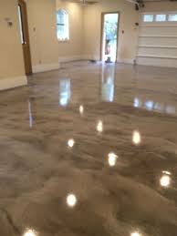 Cut in along the edges of your garage with a brush and then use a roller with a medium nap to apply the rest of the paint. Metallic Floors Step By Step Instructions For Free Epoxy Metallic Floor Garage Floor Paint Metallic Epoxy Floor