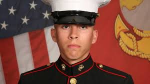 I love my job': US Marine posted moving photo of herself with an Afghan  child just days before she was killed