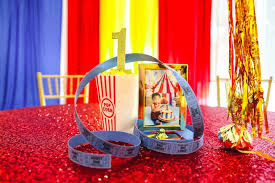 Next, we put out the popcorn boxes with mini swirl lollipops and Kara S Party Ideas First Birthday Carnival Party Kara S Party Ideas