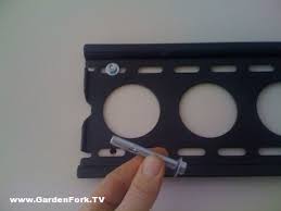 Attaching wooden fences to concrete block is simply a matter of hardware. Hang A Tv On A Brick Or Concrete Wall Gardenfork Eclectic Diy