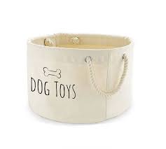 With an interior that can be wiped clean and a pair of rugged rope handles, it's easy to clean and transport. Dog Toys Basket Dog Toys Storage Bag Dog Toys Bin Dog Toys Etsy In 2021 Dog Toy Storage Baskets Dog Toy Basket Dog Toy Storage
