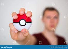 Young Man Holding the Pokeball Editorial Image - Image of pokemon,  technologies: 77157145