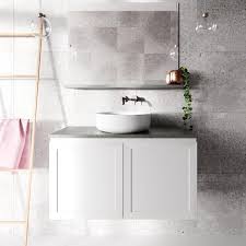 Natural white quartz and varying heights and depths of base cabinetry create the look of furniture rather than kitchen cabinetry. Rifco Imperial Vanity With Caesarstone Top Basin The Blue Space
