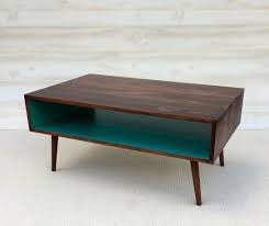 Dowel legs and an oval top give the coffee table the silhouette of authentic pieces from the 1950s and '60s. 50 Images Of Amazing Mid Century Modern Furniture Coffee Table Hausratversicherungkosten