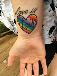 Adele givens from the album harverd dropout. 15 Awesome Love Is Love Tattoo Designs Body Art Guru