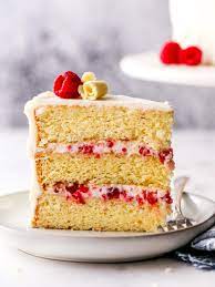 Heat the heavy whipping cream just until it begins to boil, then pour it over the chocolate chips. Raspberry White Chocolate Cake Completely Delicious