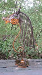 These two charming little lawn ornaments were wandering on the grounds of an animal sanctuary in southern utah. Garden Art Garden Art Made From Metal