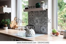 Bright white kitchen with household items. Shutterstock Puzzlepix