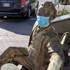 The statue's head broke off as it crashed to the ground. 1