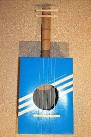 Lbpl Kids Blog Make Your Own Guitar With Household Items Music Instruments Diy Homemade Instruments Diy Musical Instruments