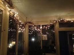 How to create unique lighting from grapevine, wire, and beach balls. Pin By Jennie Mcdonald On Christmas Creations Front Porch Decorating Grape Vine Decor Decorating With Grapevine