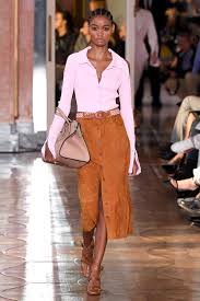 L'abbigliamento e le tendenze della moda anni '70. Maniere Sommerso Letto Gonne Anni 70 Esterno Amoroso Sangue