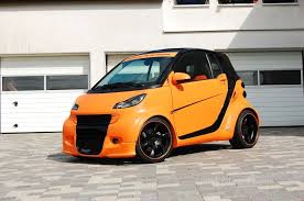 Big Orange Smart Im Breitbau Look Smart Ganz Wild Smart Fortwo Cabrio Auto Der Woche Smart Fortwo Smart Car Cute Small Cars