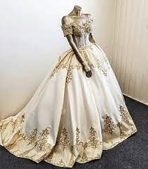 This Gold And Ivory Bridal Gown Has A Regal Feel Making Custom Weddingdresses Like This In A Price Range You Can Afford Is Not A Gowns Gowns Dresses Dresses