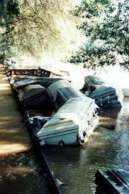 Sharpbriar Malformalady Images Of Caskets That Popped Out Of The Saturated Soil During The Flood Of 94 Still Haunts Many Cemeteries Cemetary Old Cemeteries