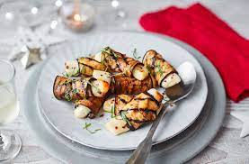 This Meat Free Aubergine And Halloumi Pigs In Blankets Recipe Is A Tasty Vegetarian Christmas Side See More Veg Halloumi Tesco Real Food Vegetarian Christmas