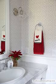 Use plaid to update your bedding, bathroom textiles, and living room throws, or use it in classic christmas decorations like stockings. Christmas Powder Bathroom 12 Days Of Holiday Homes The Sunny Side Up Blog