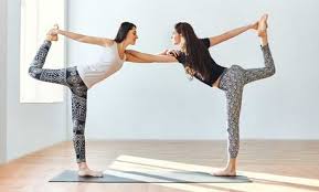 Stretches the hamstrings and calms the nervous system. 12 Easy Yoga Poses For Two People Friends Partner Or Couples Yoga Shape Mi Now Health Fitness Clothing Shapewear Store