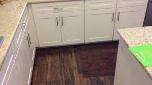 If you want to eliminate worries about moisture, install sheet vinyl or luxury vinyl plank (lvp). Installing Laminate Flooring Around Kitchen Cabinets