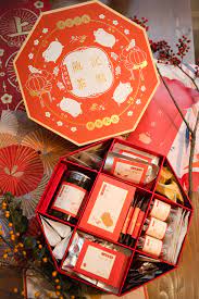 Baoji Chinese New Year Tea Snacks Gift Box Packaging On Behance Gift Box Design Tea Gift Box Box Packaging Design