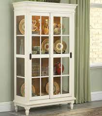 Find high quality curio cabinets for sale online at home gallery stores. Whitewood Dining Room Pieces H60 81 Curio Cabinet With Crown Moulding Turned Feet And Sliding Glass Doors Esprit Decor Home Furnishings Curio Cabinets