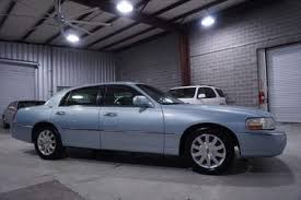 Image result for Light Ice Blue 2010 Town Car