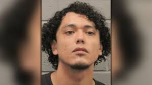 Man who exchanged gunfire with Houston police charged with assault