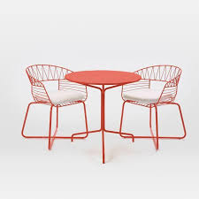 A Bistro Set Brings Parisian Charm Right To Your Backyard Patio Furnishings Bistro Table Outdoor Used Outdoor Furniture
