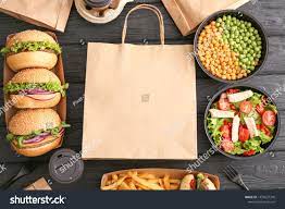 Different Tasty Food From Delivery Service On Wooden Background Sponsored Sponsored Delivery Food Tasty B Food Delivery App Online Food Food Ordering App