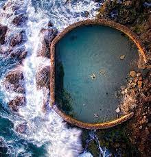 Continue walking north, around the bluff and over the rocks and past another sandy beach section. Victoria Beach Laguna Victoria Beach Places To Go Places To Travel