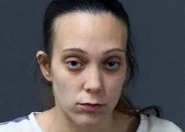 Woman accused of intimidating murder witness 'got stomped