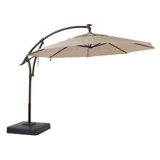 Hampton Bay 11 Ft Led Round Offset Outdoor Patio Umbrella In Sunbrella Sand Yjaf052 A The Home Depot Cantilever Patio Umbrella Sunbrella Patio Patio Umbrella