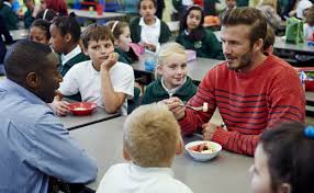 David beckham certainly has something to smile about! David Beckham Visits His Old Primary School For Active Kids Sainsbury S