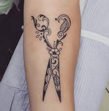 Adorn your wrist with such attractive designs! Tattoos For Hair Stylists Tattoo Artists Inked Magazine Hairstylist Tattoos Stylist Tattoos Cosmetology Tattoos