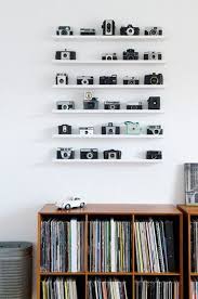 How To Turn Your Vintage Camera Collection Into Wall Art Retro Home Retro Home Decor Decor