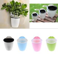 4.5 out of 5 stars. Self Watering Plant Flower Pot Wall Hanging Plastic Planter House Garden Decor Yard Garden Outdoor Living Baskets Pots Window Boxes