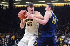 iowa basketball hawkeyes face 4 michigan wolverines in