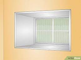 Using the saber saw or similar tool cut a line from each hole. 6 Ways To Install An Inwall Air Conditioner Wikihow