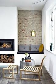 The living room and dining room were originally separated by a central fireplace, which interior designer nicole hollis removed to create this great room. Cozy Modern 10 Minimalist Fireplaces Built In Bench Seating Minimalist Fireplace House Interior