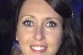 Man held after young mum's body found in hotel room