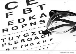 Optometry Eye Chart With Eyeglasses Glowing From Underneath