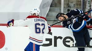 Canadiens center jake evans had to be stretchered off the ice toward the end of montreal's game 1 win over the winnipeg jets after he was hit high by mark scheifele. Sw 8ypz Rxinwm