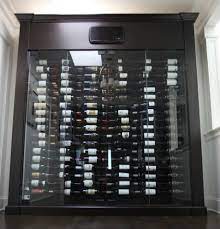 The door to your wine cellar is the first impression of your entire wine storage room.if you love to make a good first impression, you will want a stylish, unique, or artistic custom wine cellar doors to grace your wine room. West Vancouver Custom Glass Wine Cabinet